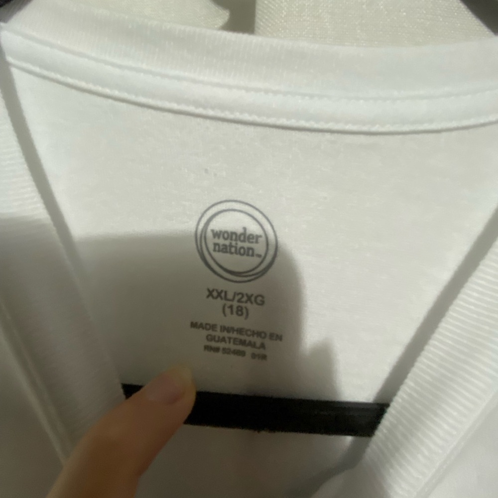 Plain white shirt originally for tie dyeing.